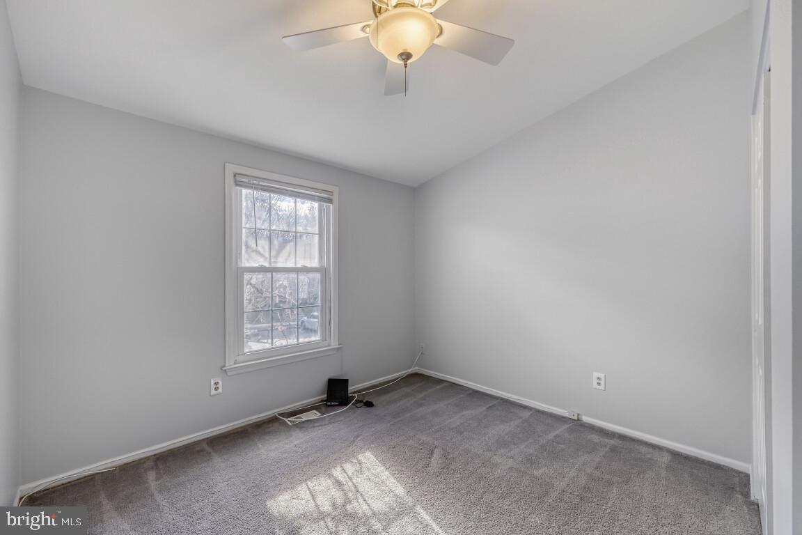 7222 Brookfalls Terrace Baltimore, MD 21209 - Photo 11 of 17 an empty room with a window