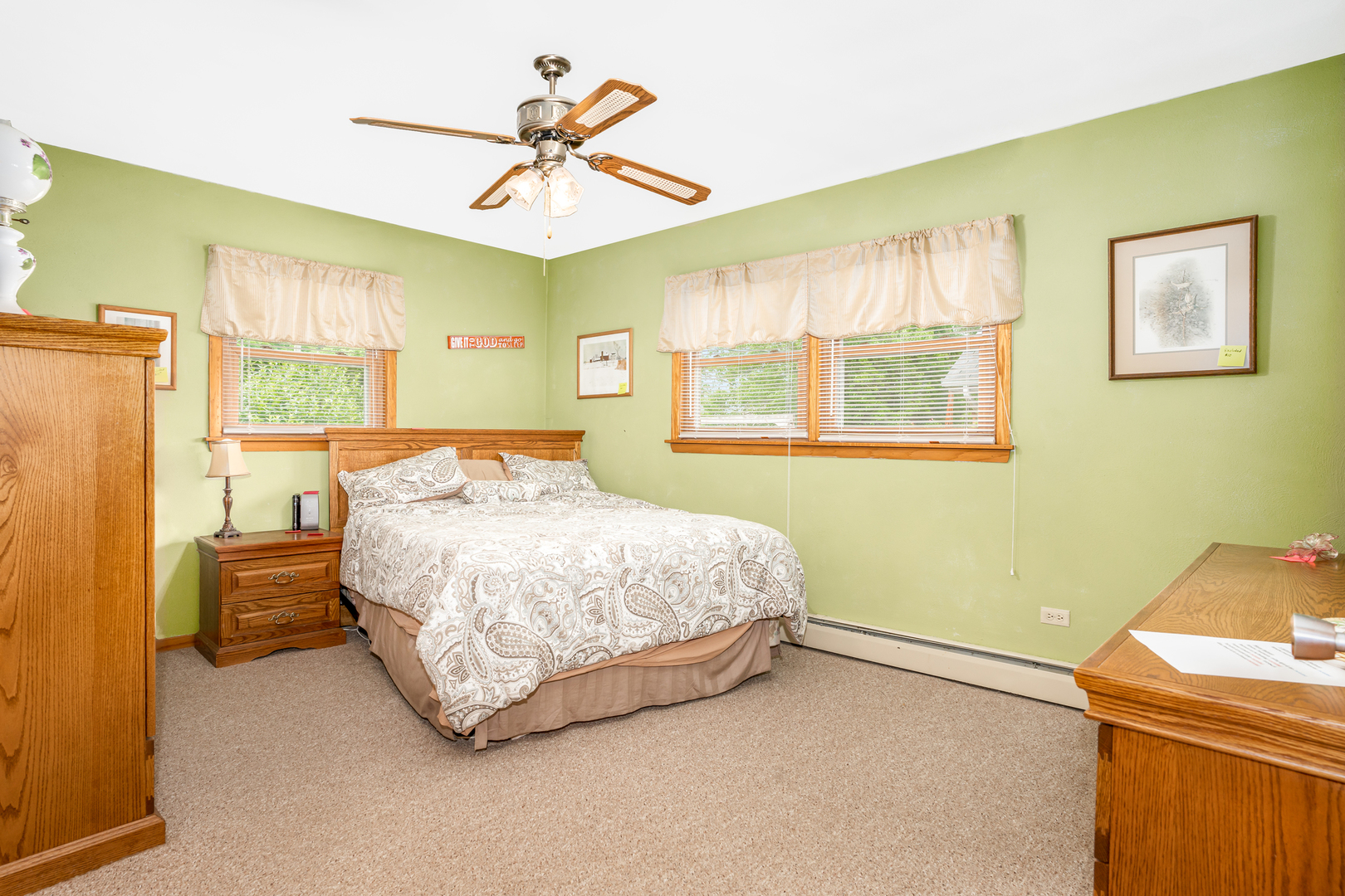 11025 Bryant Road Mokena, IL 60448 - Photo 11 of 21 a bedroom with a bed dresser and a window