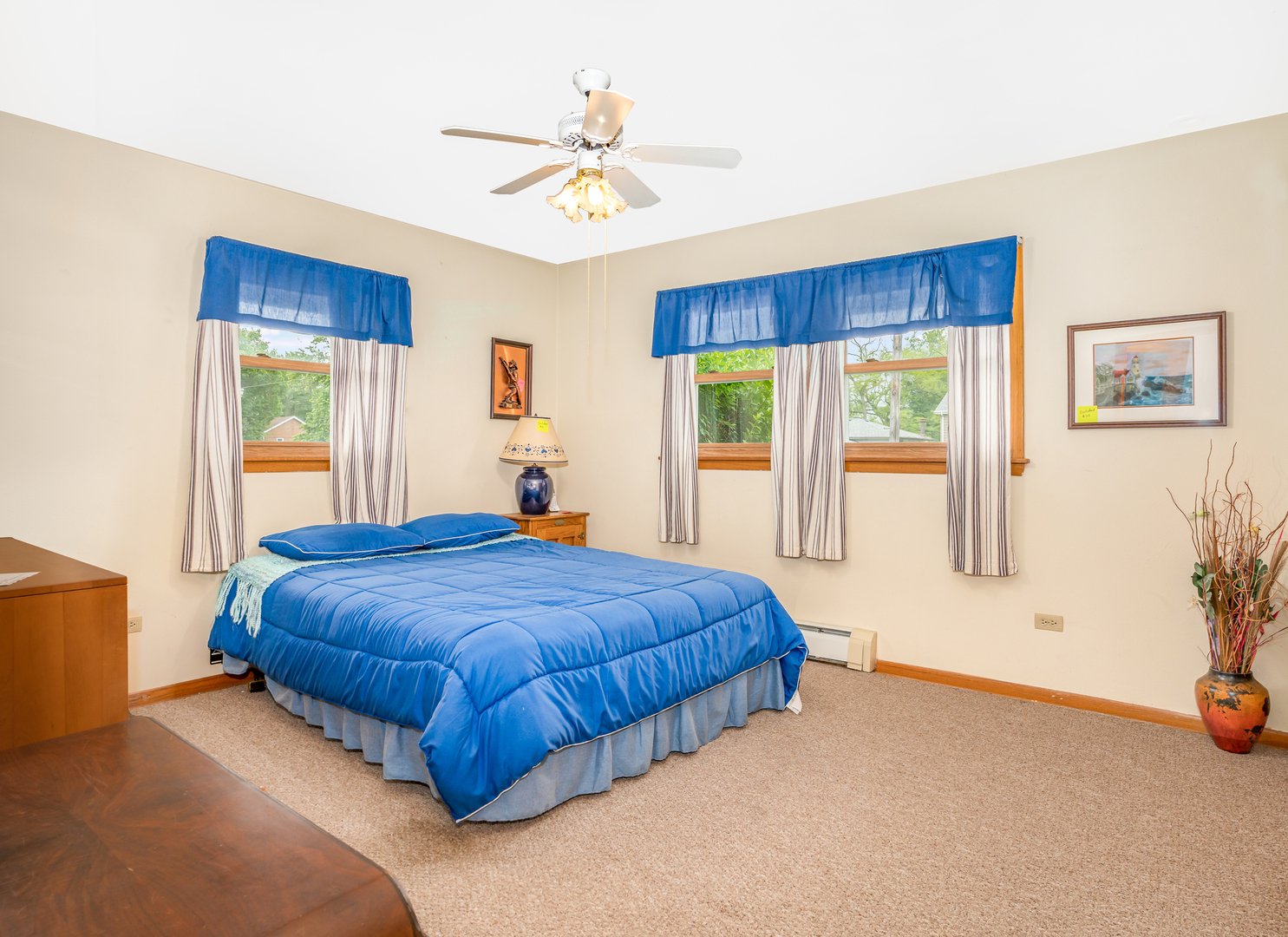 11025 Bryant Road Mokena, IL 60448 - Photo 12 of 21 a bedroom with a bed and a large window