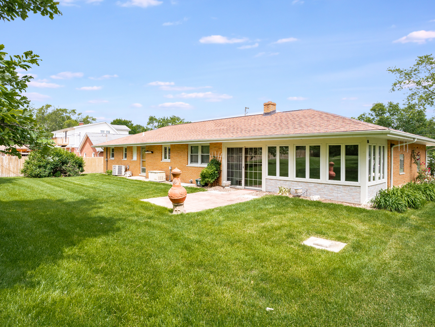 11025 Bryant Road Mokena, IL 60448 - Photo 2 of 21 a view of a house with a yard porch and sitting area