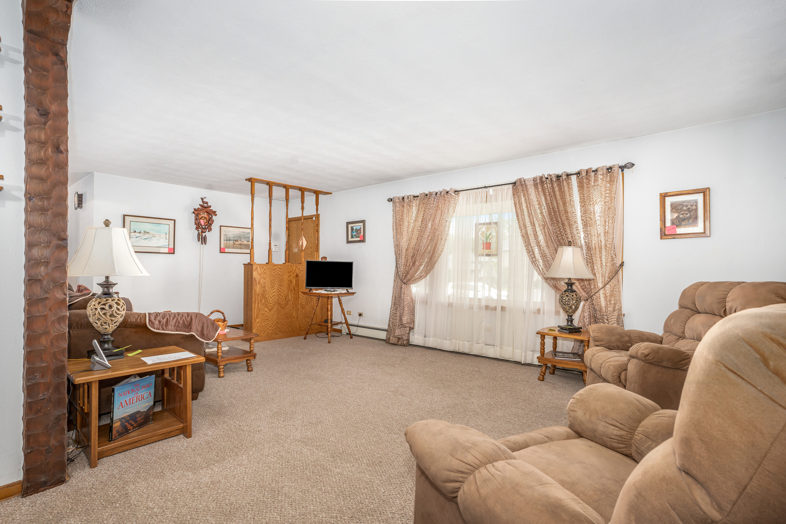11025 Bryant Road Mokena, IL 60448 - Photo 5 of 21 a living room with furniture and a flat screen tv