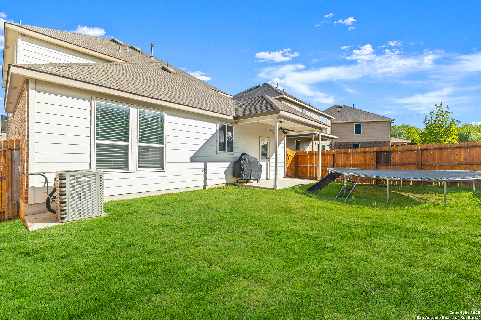 1447 Polydora San Antonio, TX 78245 - Photo 32 of 33 a house view with a garden space