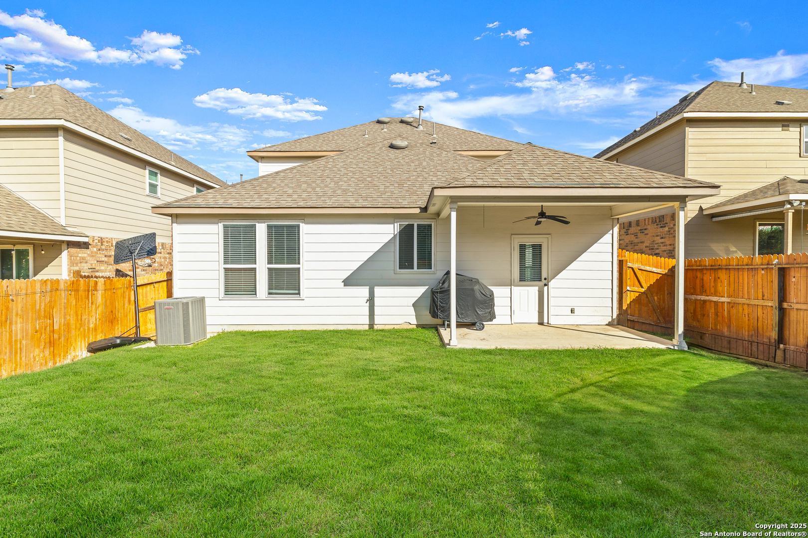 1447 Polydora San Antonio, TX 78245 - Photo 33 of 33 a view of a house with a yard and sitting area