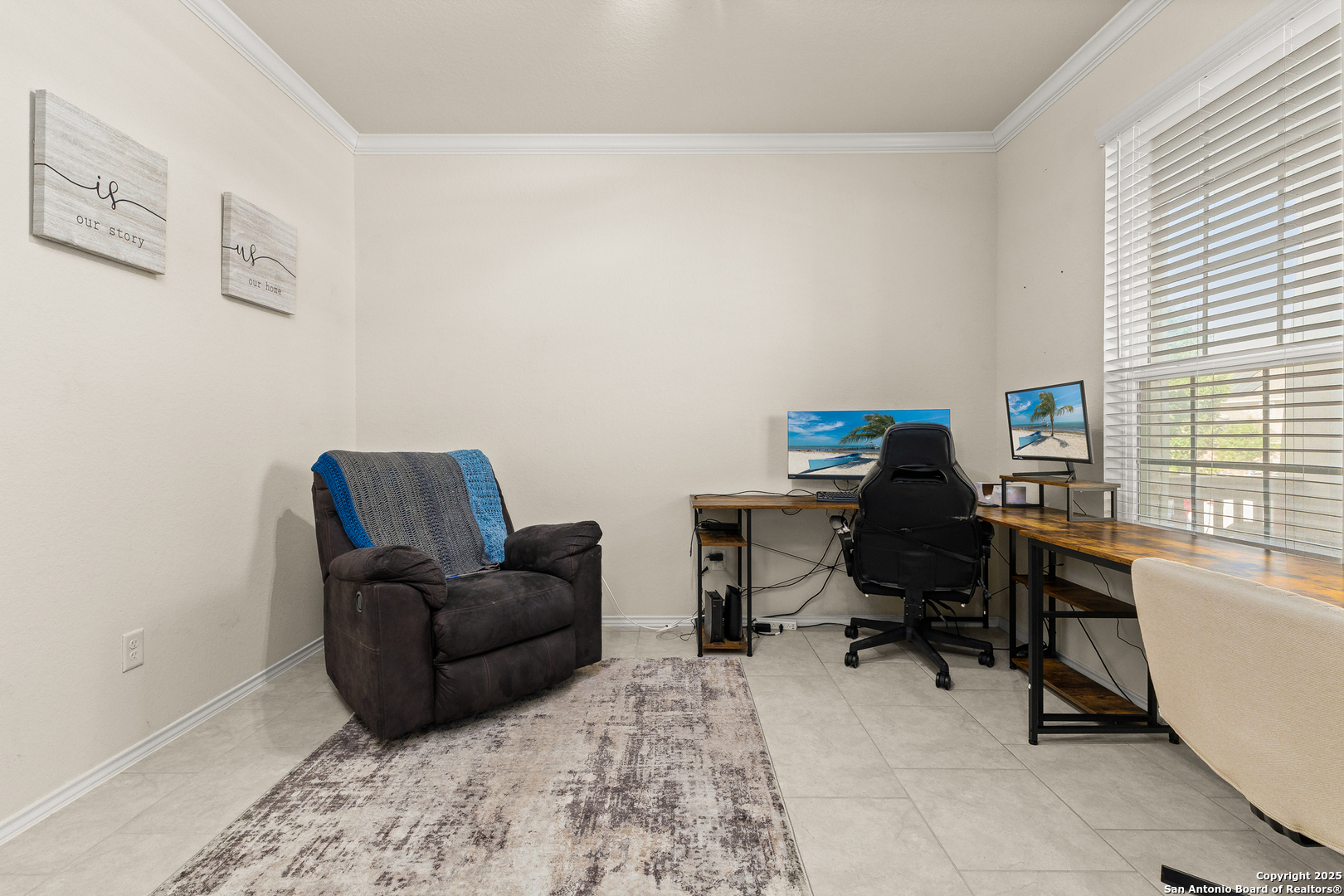 1447 Polydora San Antonio, TX 78245 - Photo 8 of 33 a view of a workspace with furniture and a window