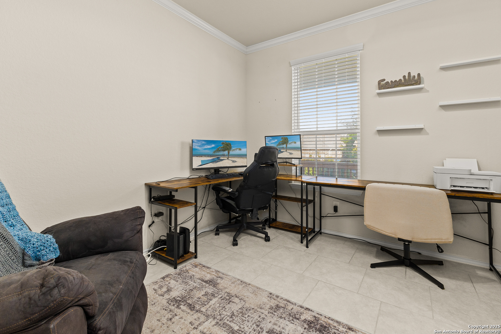 1447 Polydora San Antonio, TX 78245 - Photo 9 of 33 a view of a livingroom with workspace and a couch