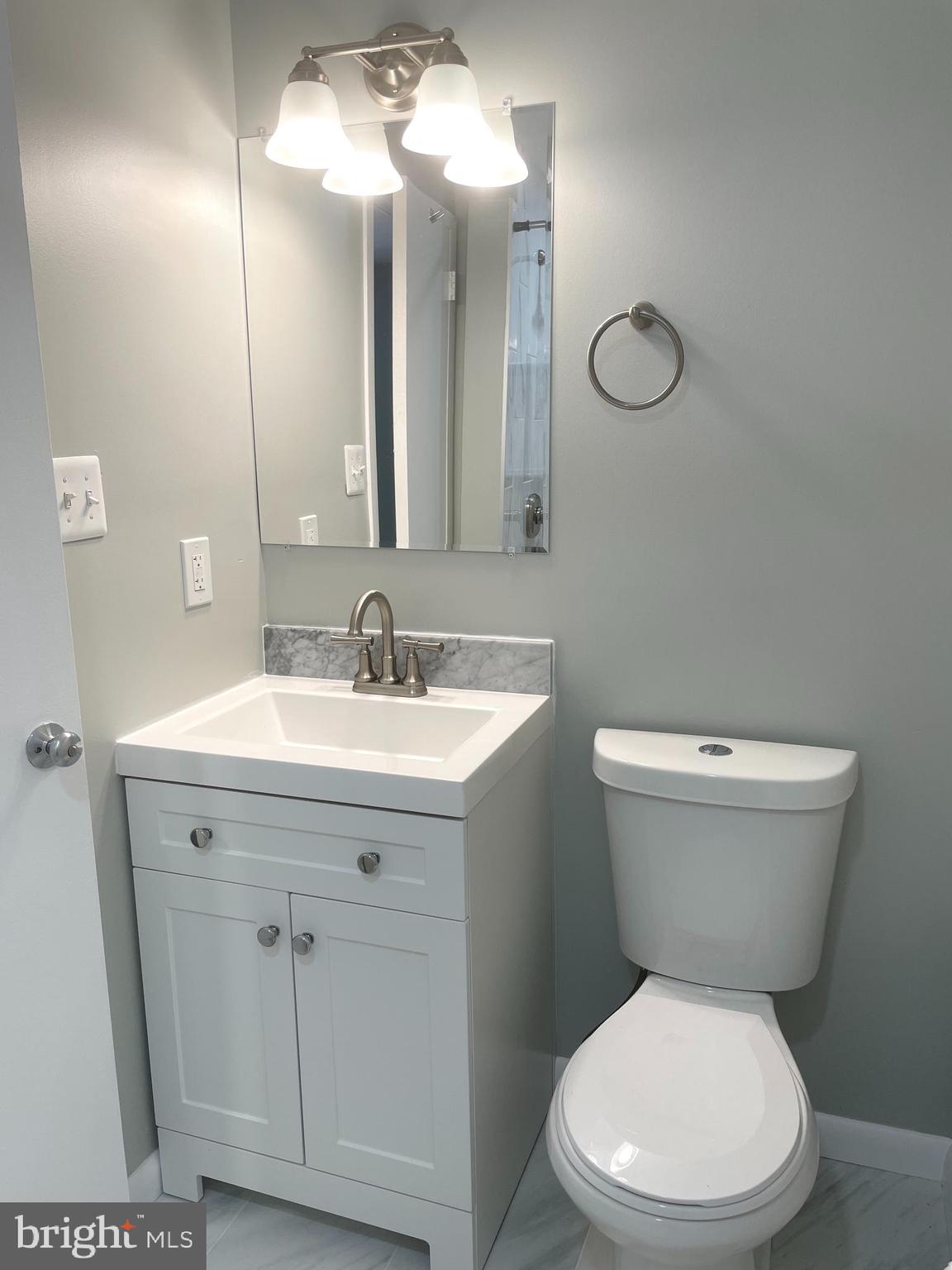 2214 Castle Rock Square, Unit 22C Reston, VA 20191 - Photo 18 of 32 MASTER BATH w/new vanity, faucet, toilet, floor