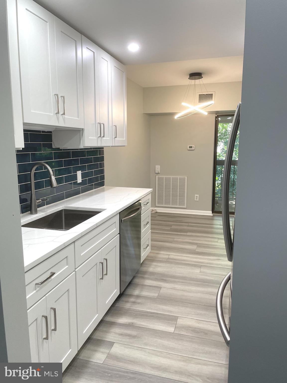 2214 Castle Rock Square, Unit 22C Reston, VA 20191 - Photo 2 of 32 Remodeled KITCHEN- new cabinets, sink & appliances