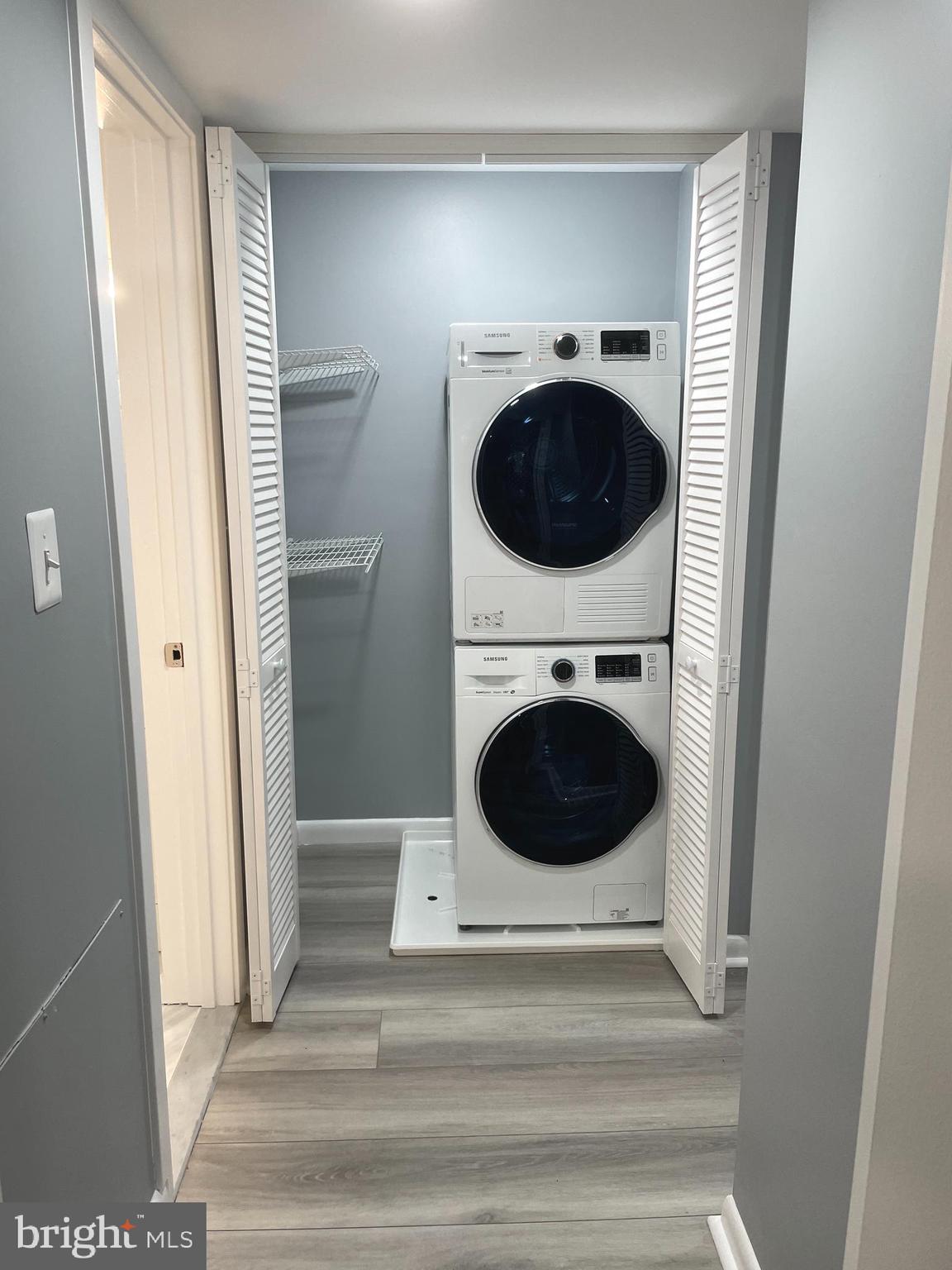 2214 Castle Rock Square, Unit 22C Reston, VA 20191 - Photo 30 of 32 New Samsung WASHER and DRYER w/shelves for storage