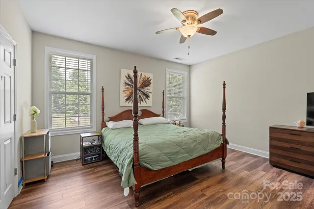 a bathroom with a sink double vanity and a mirror