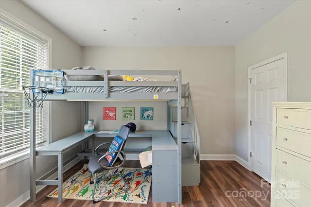 a view of a balcony with chairs