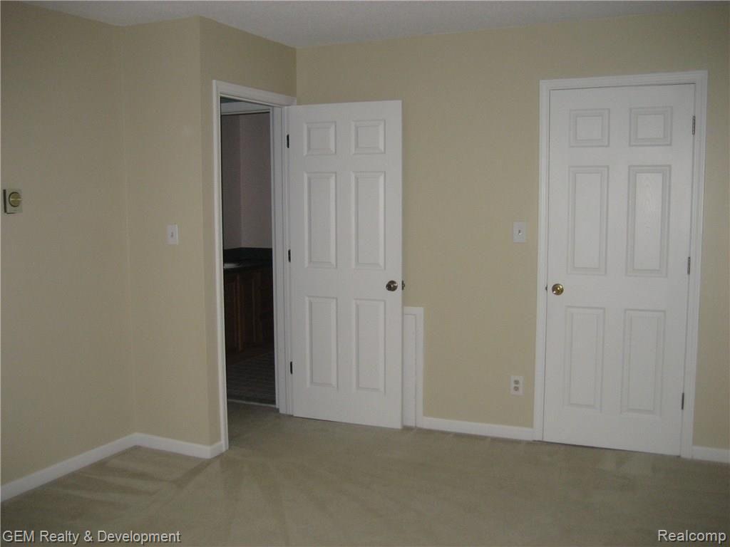 8184 24 Mile Road, Unit 26 Utica, MI 48316 - Photo 13 of 17 Master Bedroom