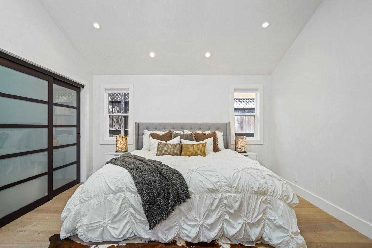 13685 Quito Road Saratoga, CA 95070 - Photo 11 of 20 a bedroom with a bed and a window