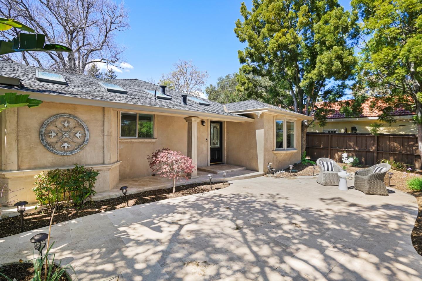 13685 Quito Road Saratoga, CA 95070 - Photo 2 of 20 a front view of a house with patio