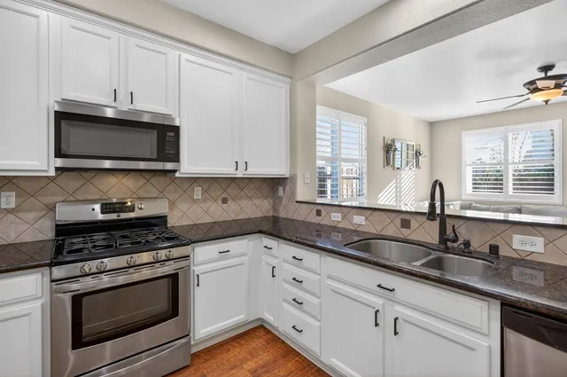 a view of a hallway with windows