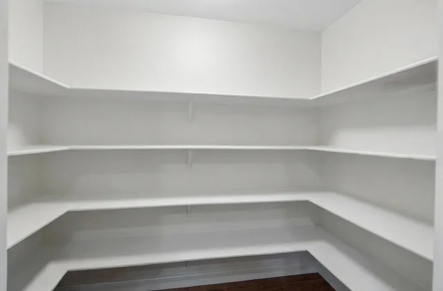 a view of a livingroom with furniture