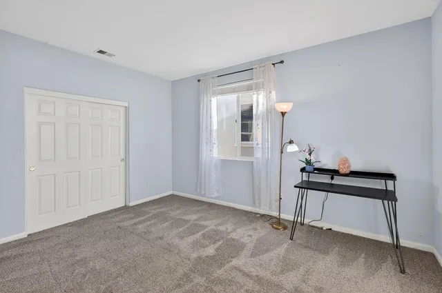 a view of an empty walk in closet