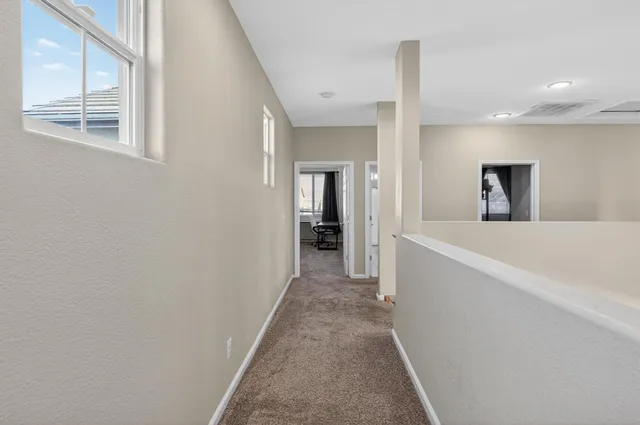 a kitchen with a sink stove and refrigerator