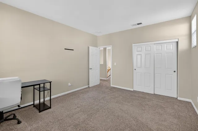 a bathroom with a tub and a shower