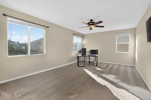 an aerial view of a house with a garden