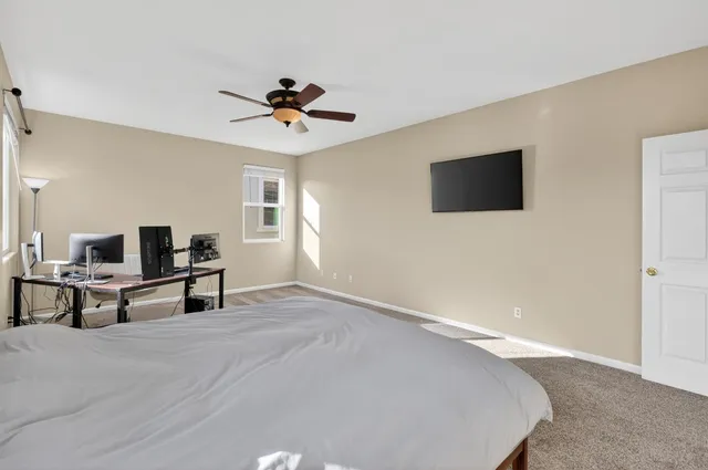 an aerial view of a house with a garden