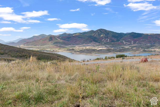 10677 North Reflection Ridge, Unit 1 Hideout, UT 84036 - Photo 39 of 41 View of mountain backdrop featuring a large body of water