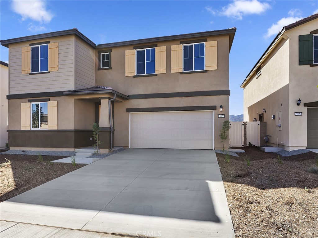 19557 Hanging Rock Road Lake Elsinore, CA 92532 - Photo 6 of 54 a view of a house with a street