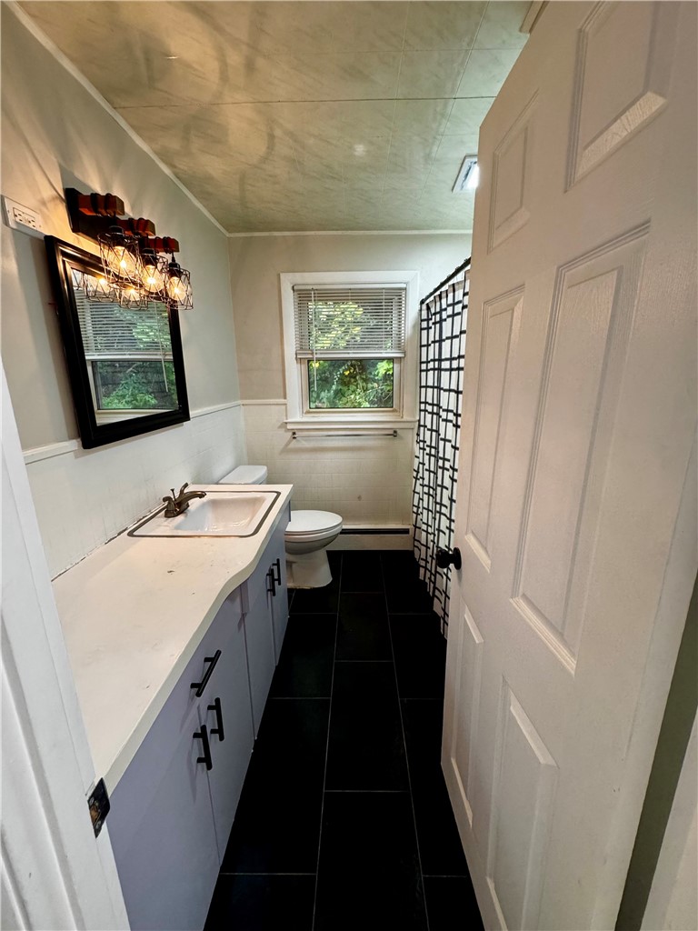 6 Sand Street Coventry, RI 02816 - Photo 10 of 18 First Floor Full Bath with Tub & Shower