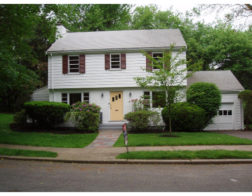 70 Boulder Road Newton, MA 02459 - Photo 1 of 12 a front view of a house with a yard
