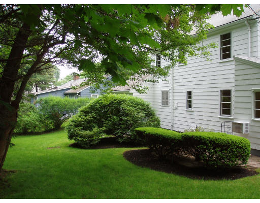 70 Boulder Road Newton, MA 02459 - Photo 5 of 12 a view of a house with a garden