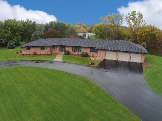 724 Timber Ridge Trail Rockford, IL 61114 - Photo 1 of 21 a house view with a garden space