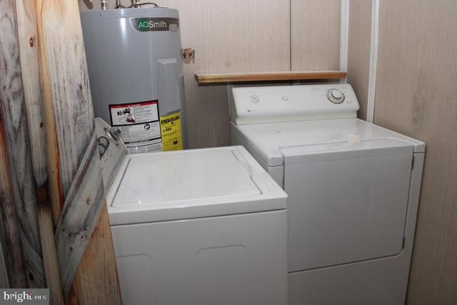 14611 Roosevelt Avenue Cascade, MD 21719 - Photo 11 of 20 a utility room with dryer and washer