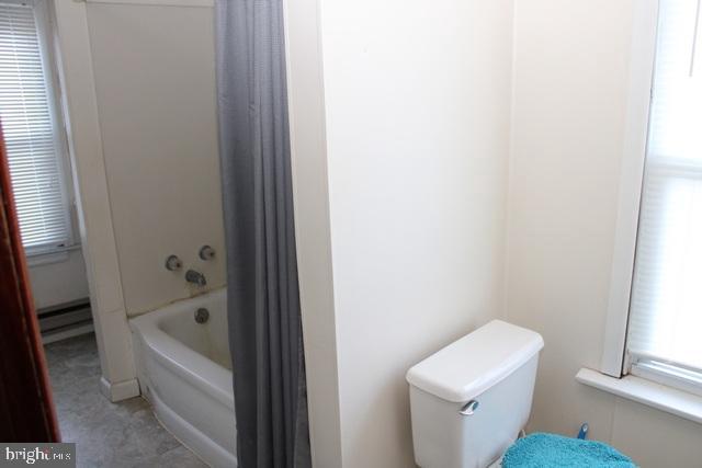 14611 Roosevelt Avenue Cascade, MD 21719 - Photo 13 of 20 a bathroom with a bathtub and window