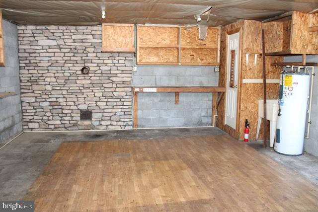 14611 Roosevelt Avenue Cascade, MD 21719 - Photo 19 of 20 a view of empty room with wooden floor and windows