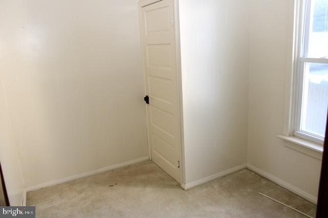 14611 Roosevelt Avenue Cascade, MD 21719 - Photo 8 of 20 an empty room with a window