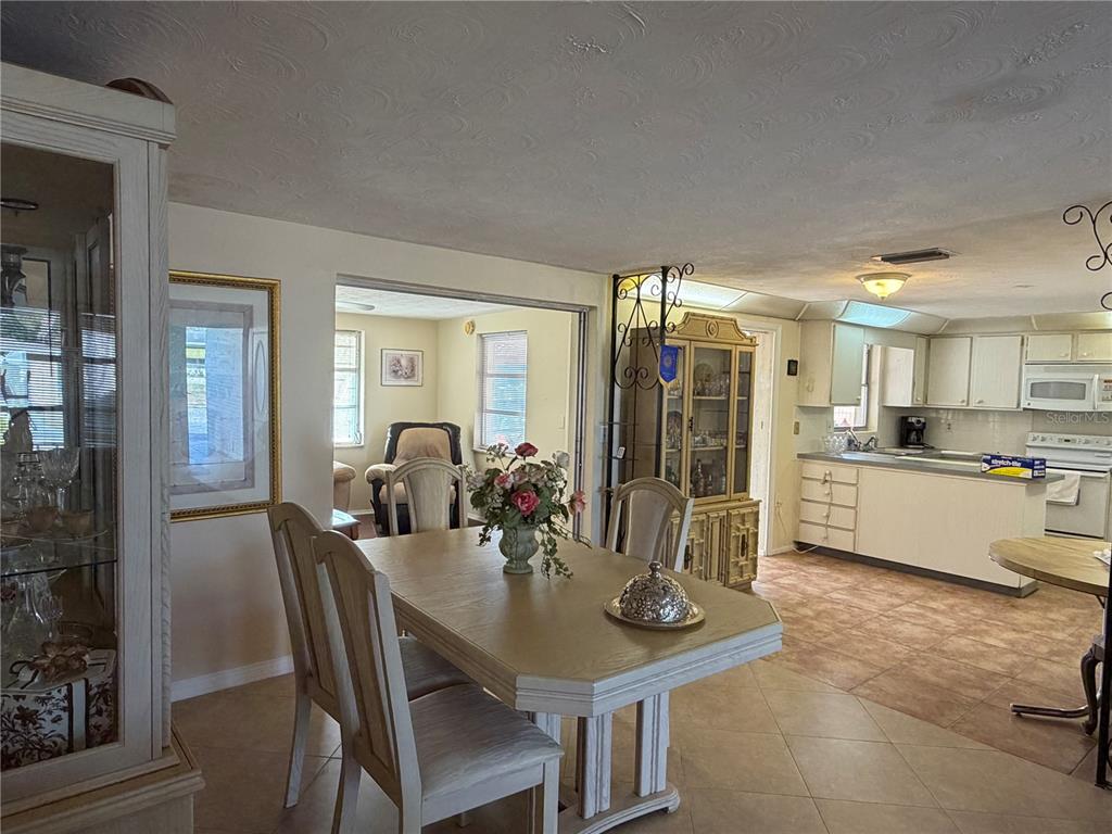 3914 Carioca Road Holiday, FL 34691 - Photo 4 of 23 a view of a dining room and livingroom view