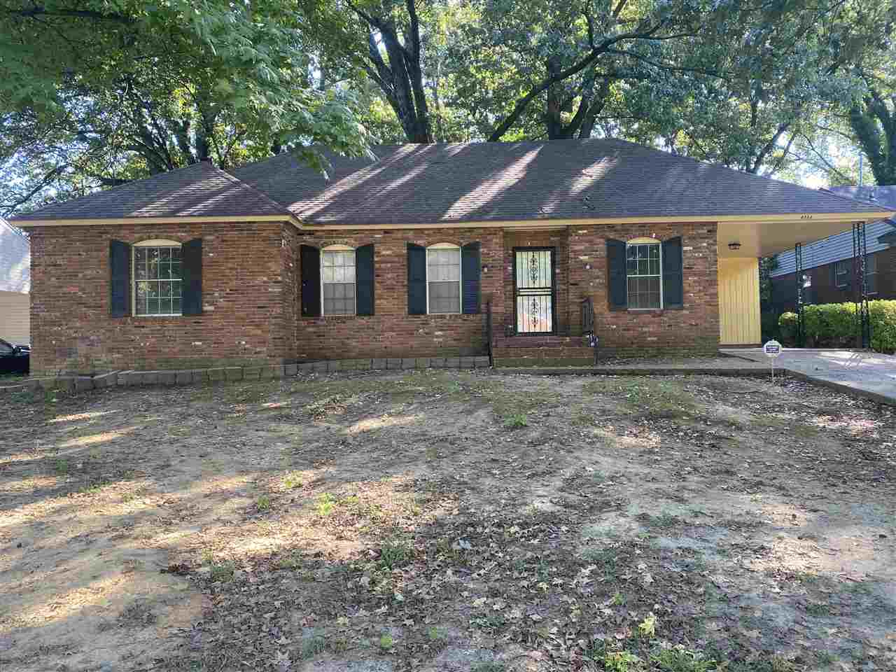 4066 Bishops Bridge Road Memphis, TN 38118 - Photo 1 of 19 a front view of a house with a yard
