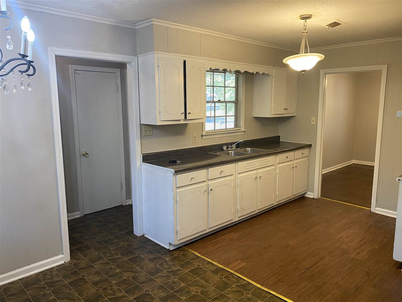 4066 Bishops Bridge Road Memphis, TN 38118 - Photo 3 of 19 a kitchen with stainless steel appliances granite countertop a stove a sink and a refrigerator