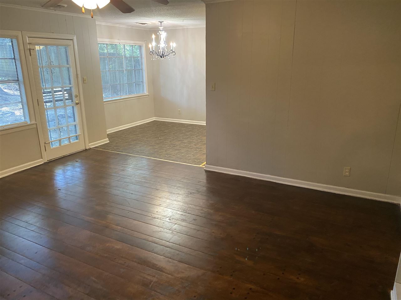 4066 Bishops Bridge Road Memphis, TN 38118 - Photo 10 of 19 an empty room with wooden floor and windows