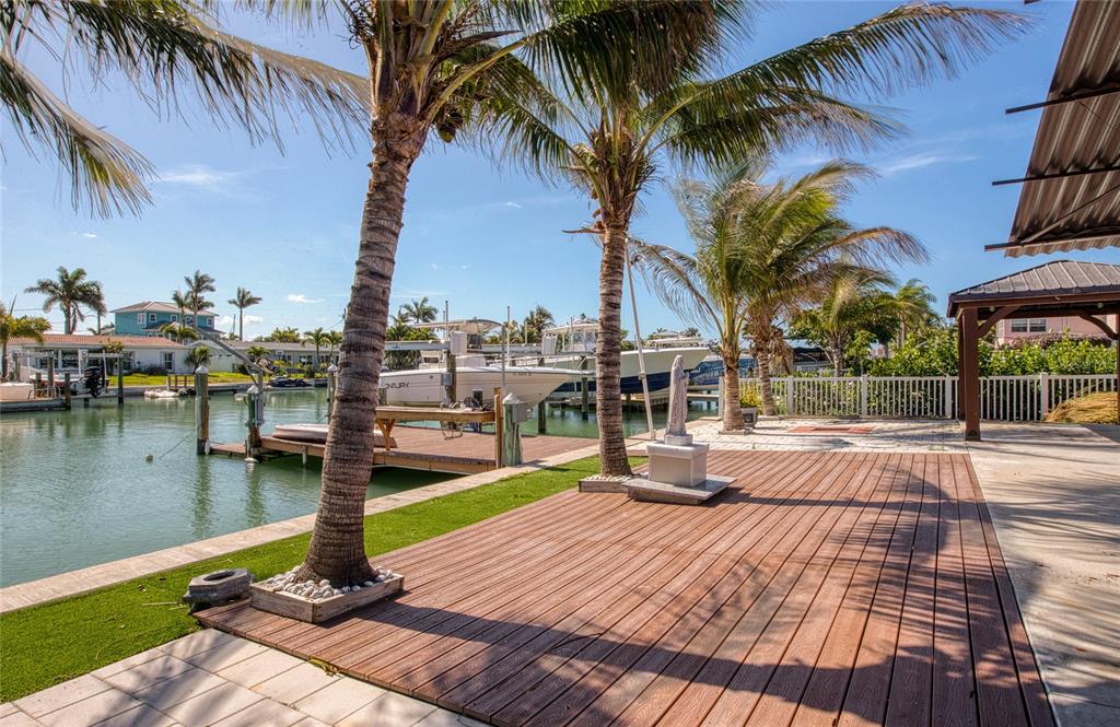 551 Crystal Drive Madeira Beach, FL 33708 - Photo 11 of 46 a park with water view and view of palm trees