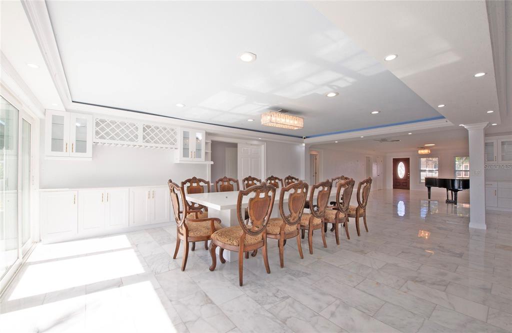 551 Crystal Drive Madeira Beach, FL 33708 - Photo 21 of 46 a dining hall with stainless steel appliances lots of white furniture