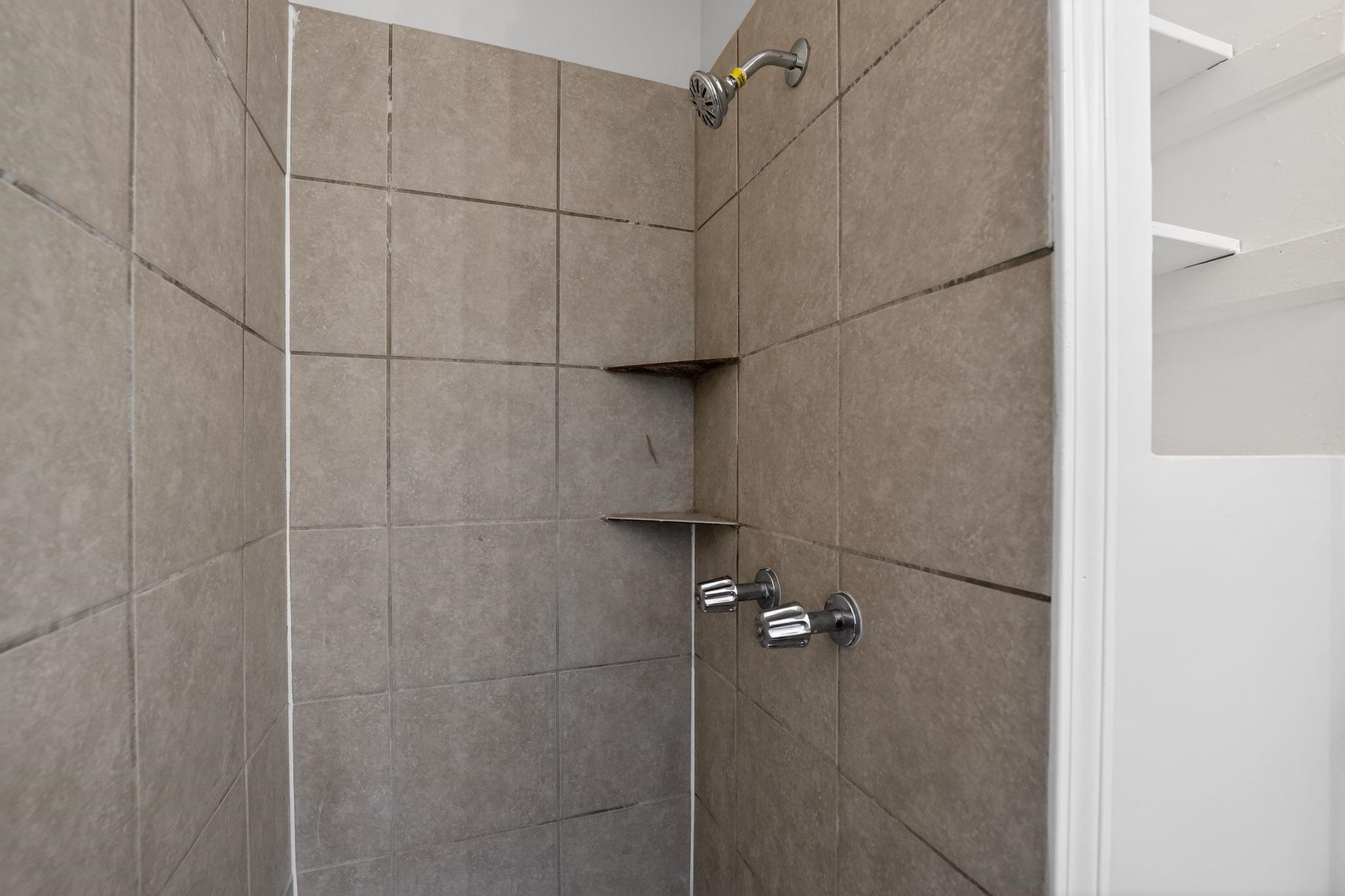 4689 Raleigh Lagrange Road Memphis, TN 38128 - Photo 23 of 30 Bathroom view of tiled shower