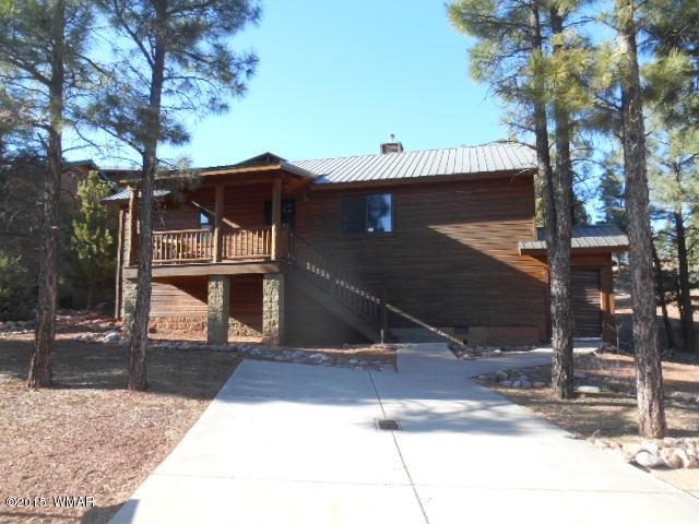 4890 West Cottage Loop Show Low, AZ 85901 - Photo 1 of 28 a view of a house with street