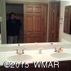 4890 West Cottage Loop Show Low, AZ 85901 - Photo 19 of 28 a bathroom with a sink and a mirror