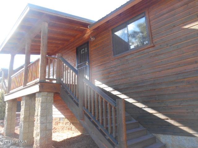 4890 West Cottage Loop Show Low, AZ 85901 - Photo 2 of 28 a view of gallery with wooden floor