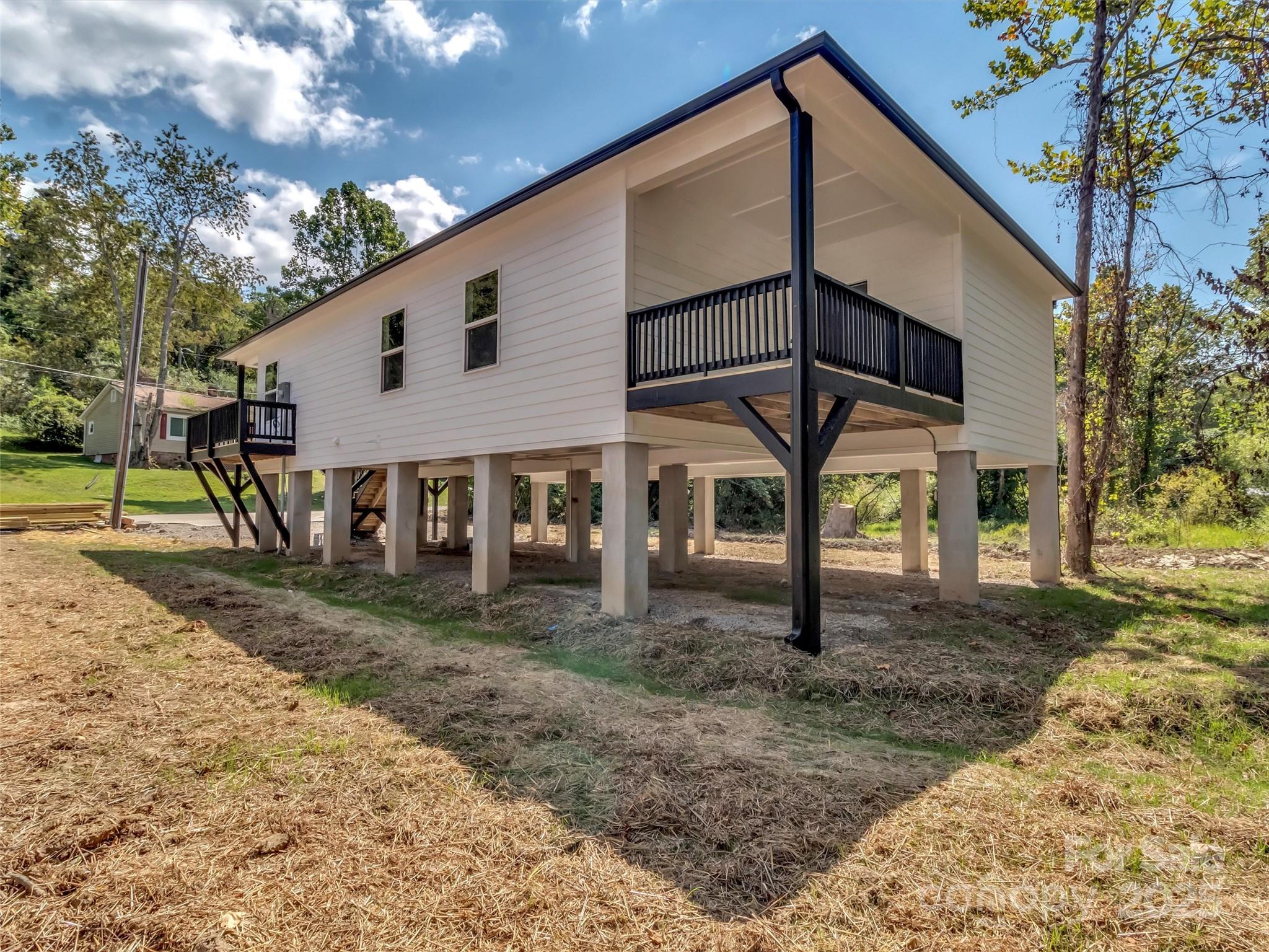 12 Whitson Road Asheville, NC 28805 - Photo 18 of 18 a view of a house with backyard