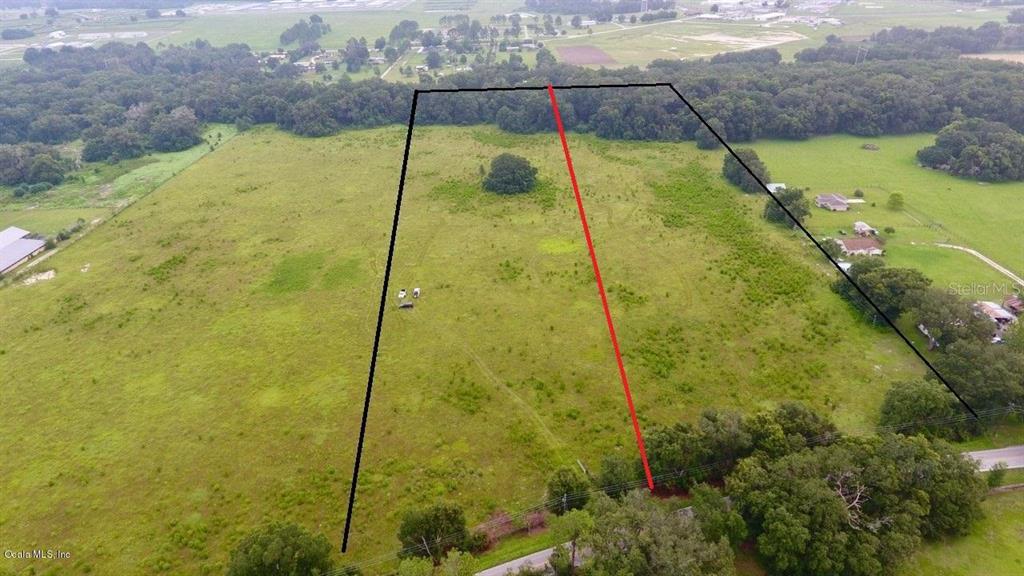 0 Northwest 100th Street Ocala, FL 34475 - Photo 1 of 1 NW 100th st split in half
