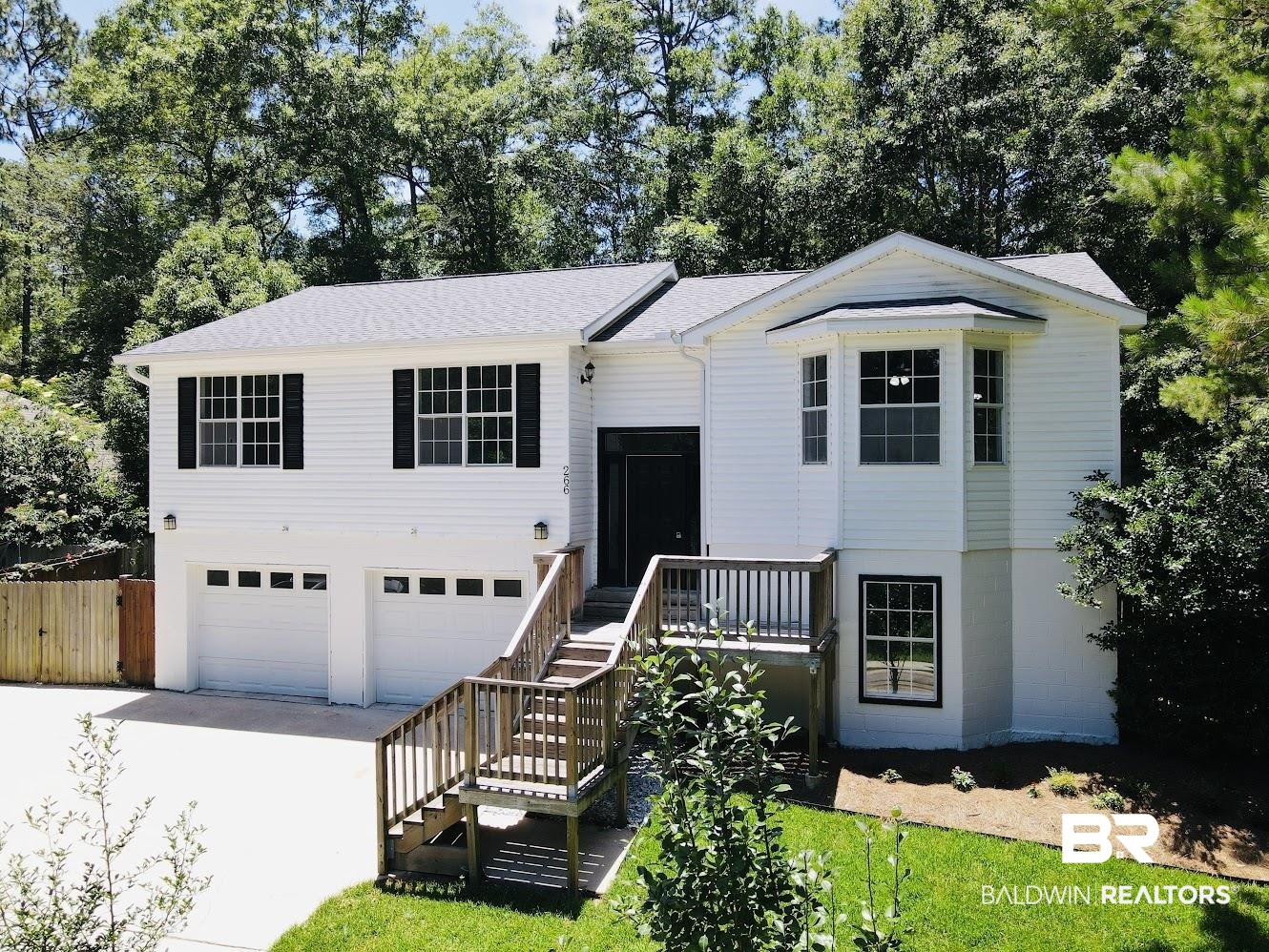 266 Ridgewood Drive Daphne, AL 36526 - Photo 1 of 34 Two-story residence featuring white siding and a gray shingle roof