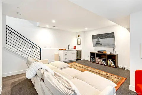 a living room with furniture and a couch