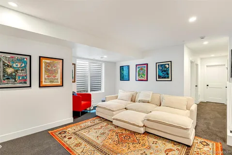 a utility room with cabinets and window