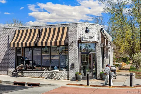 a balcony view with an outdoor seating